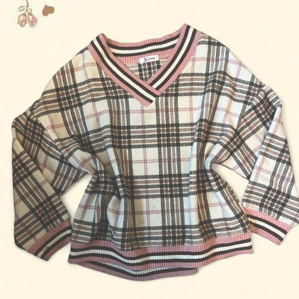 the cutest shoujo Neapolitan sweater-like top with a v-neck.